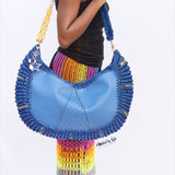 ‘Chidi’ Travel bag in Jean blue leather and Golden streaks