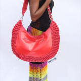 ‘Chidi’ Travel bag in Pepper Red leather