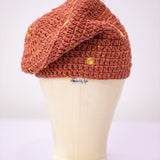 Crochet fìlà headpiece - Rust Orange (Embellished with golden eyelets)