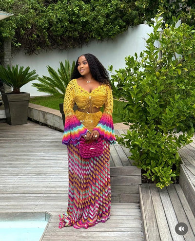 veekee james wearing hookedbylade crochet outfit in yellow and rainbow mix maxi