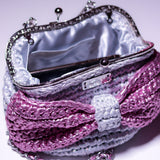 ‘Ajike’ clutch purse (with a pink bow)
