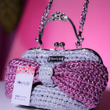 ‘Ajike’ clutch purse (with a pink bow)
